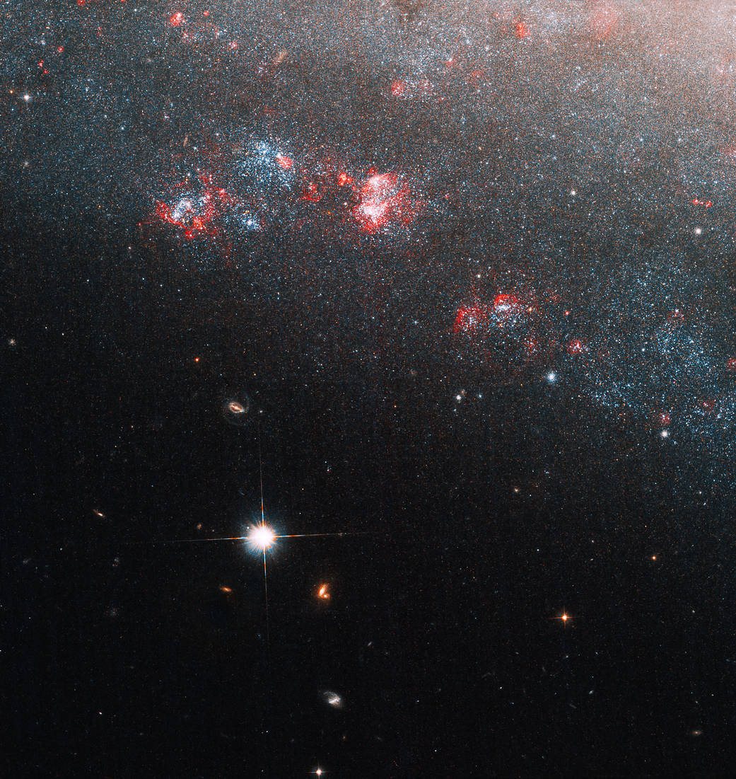 哈勃望遠鏡近期拍攝到的矮螺旋星系，代號為「針眼」。